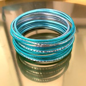 Free with purchase.  Turquoise and silver metal bangles